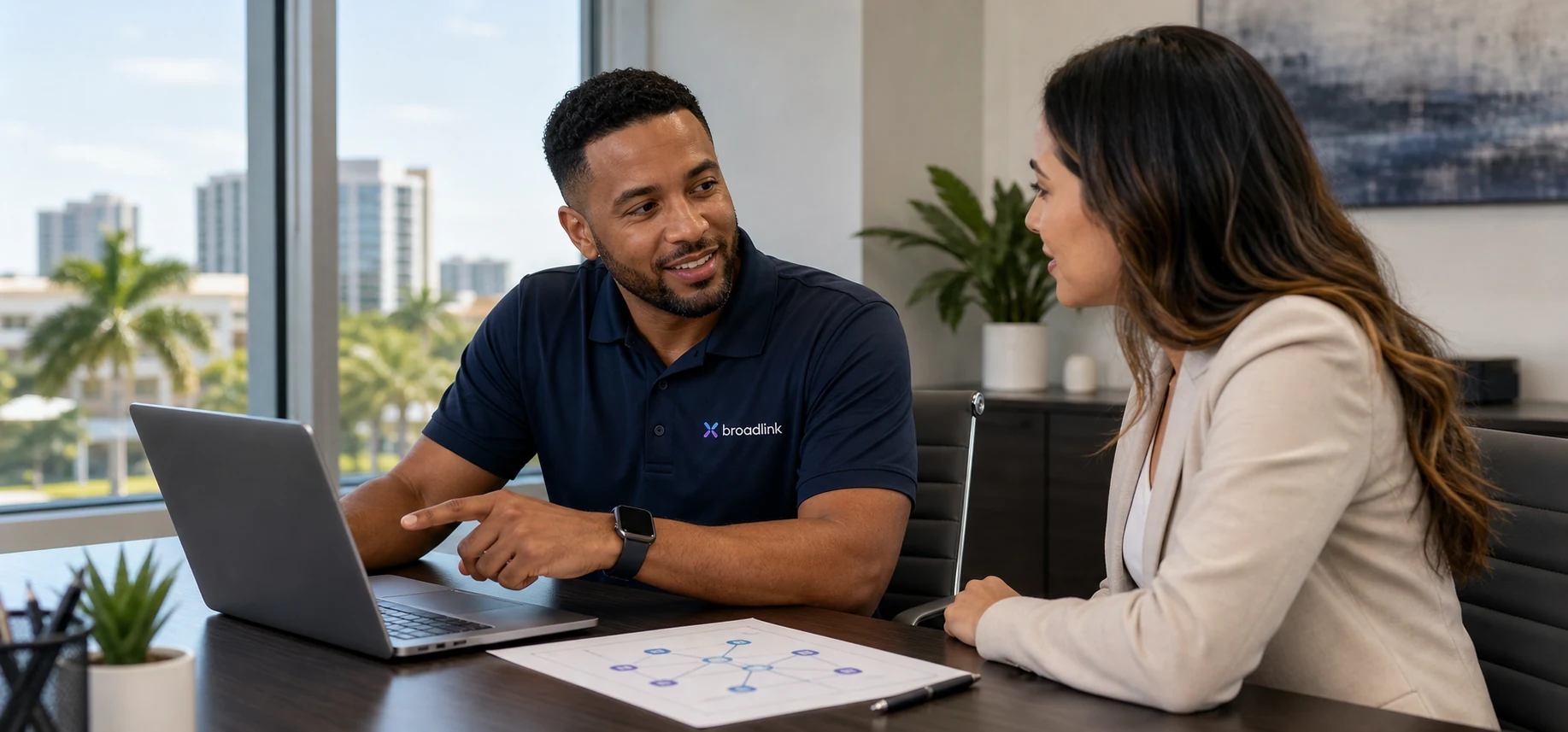 A Broadlink consultant meeting with a business client